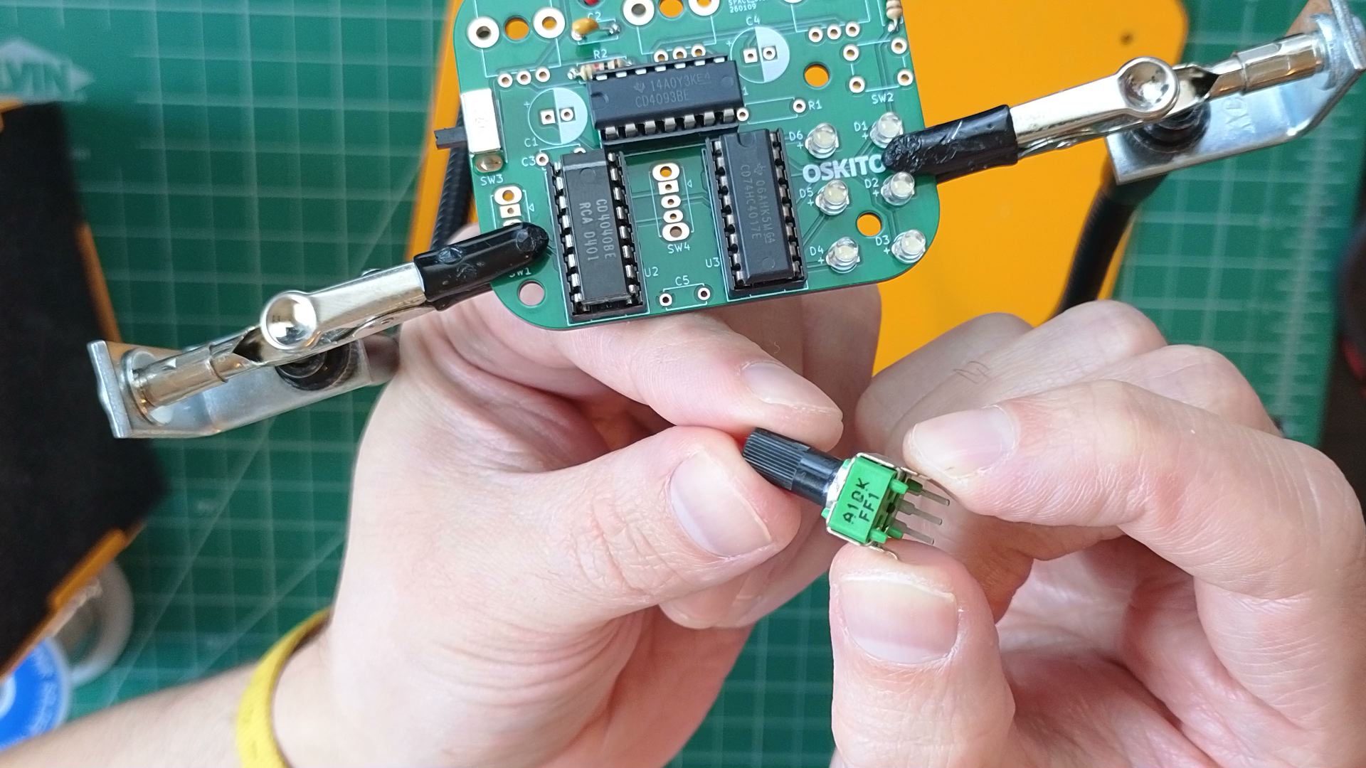 pinching potentiometer tabs