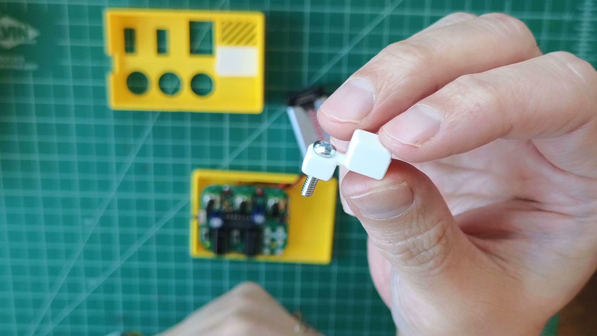 screw through button actuator